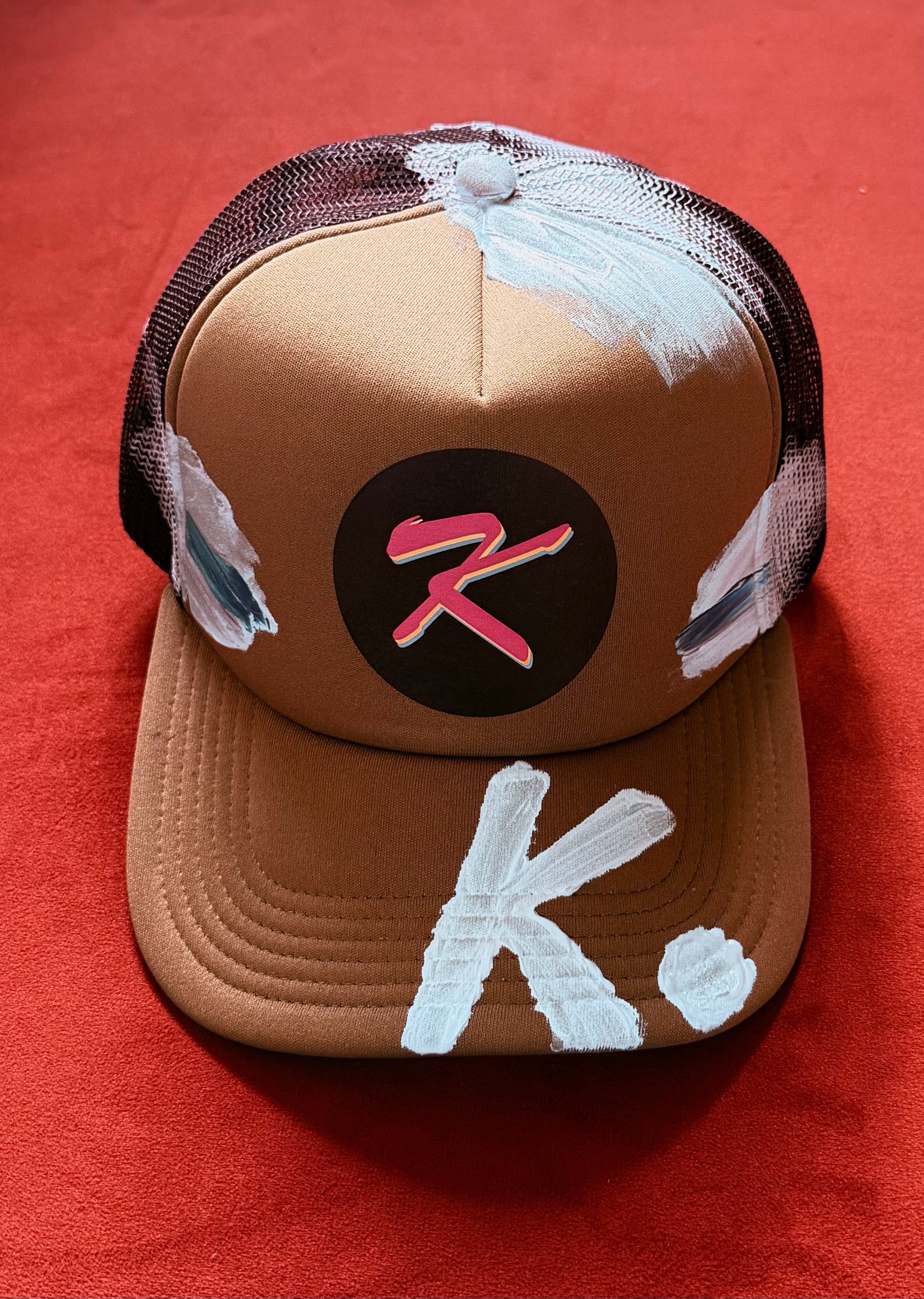 SHE NEEDS BRAG K. HAT