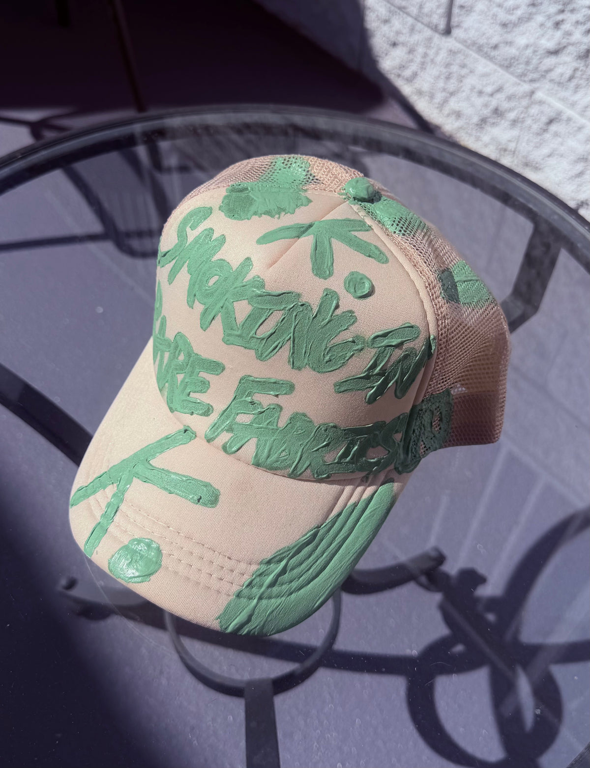 BETTER TO BE SMOKING K. HAT