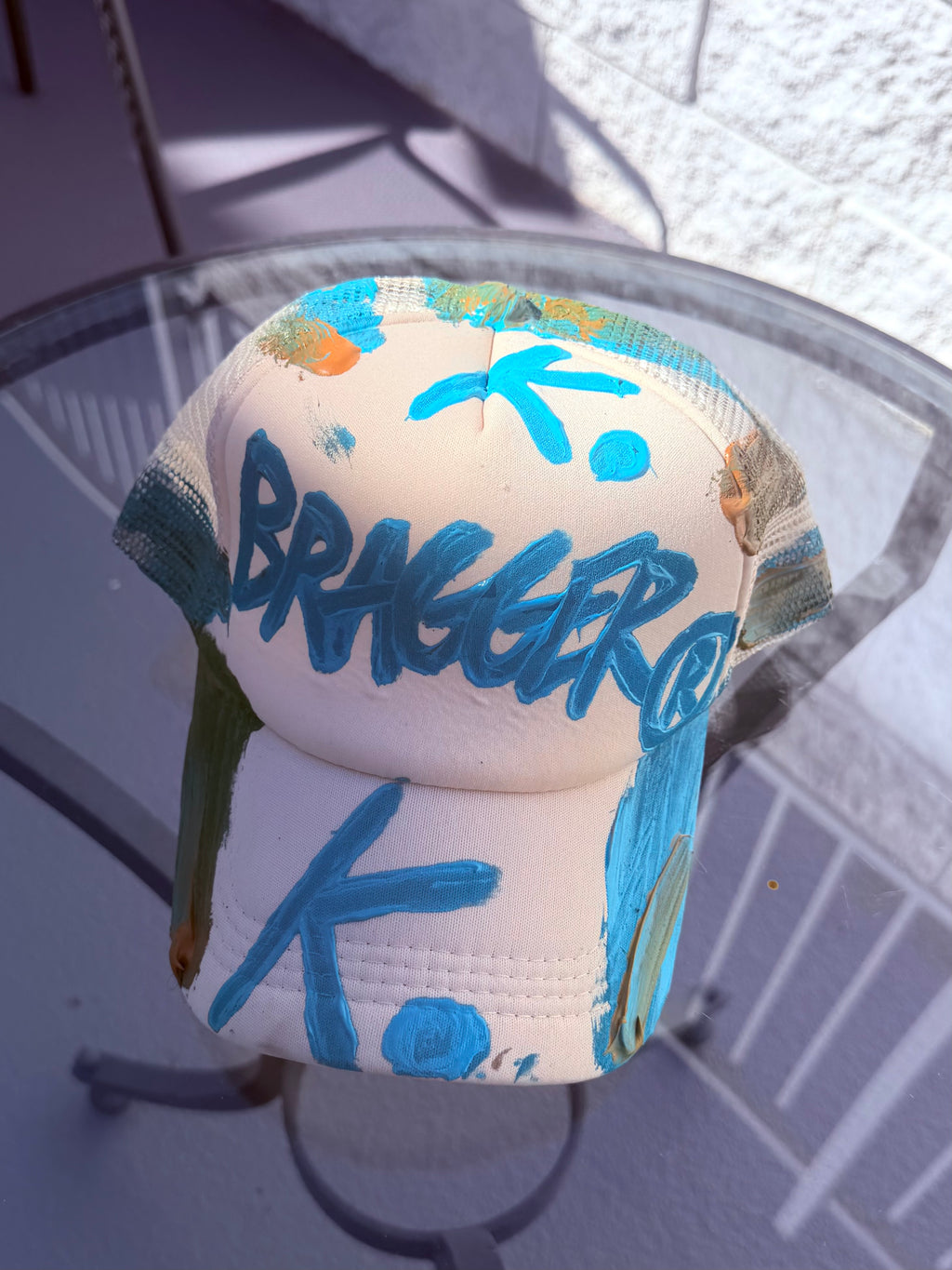 SEEMS LIKE BRAGGER K. HAT