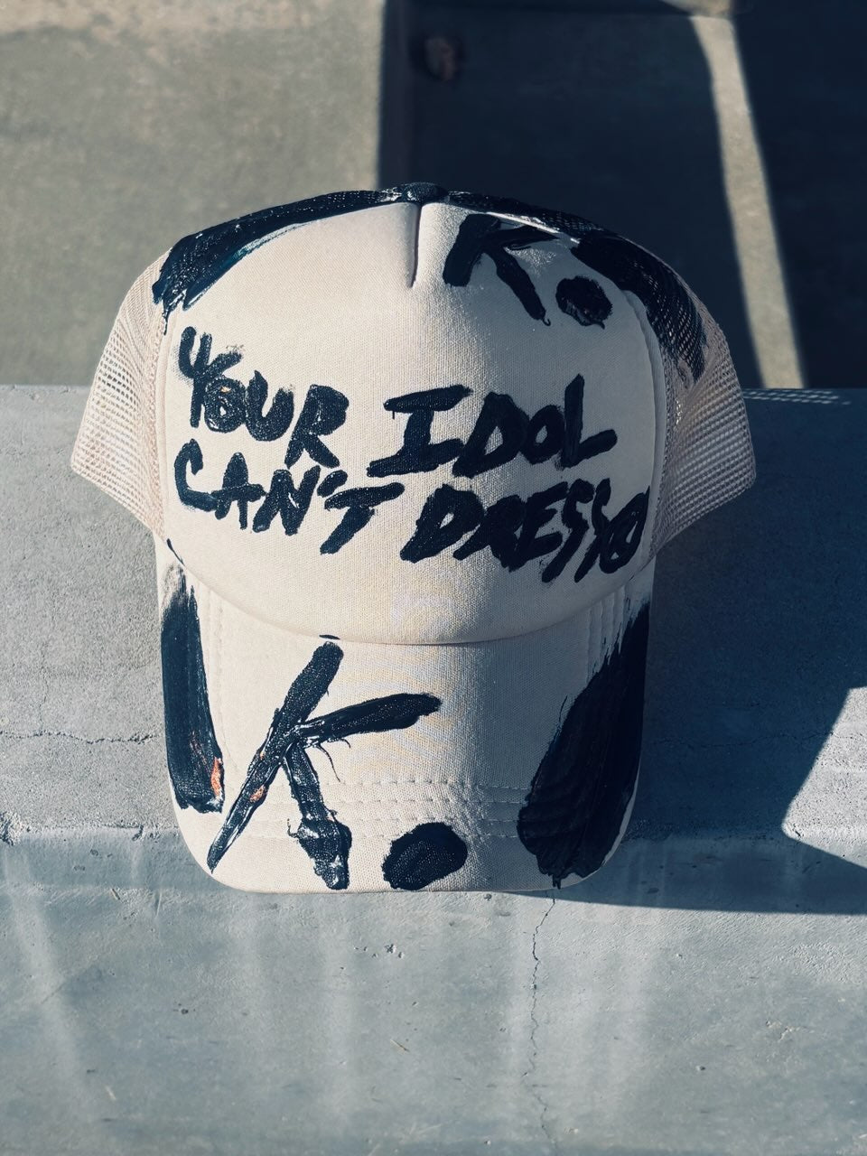 KNOWN BRAGGER K. HAT