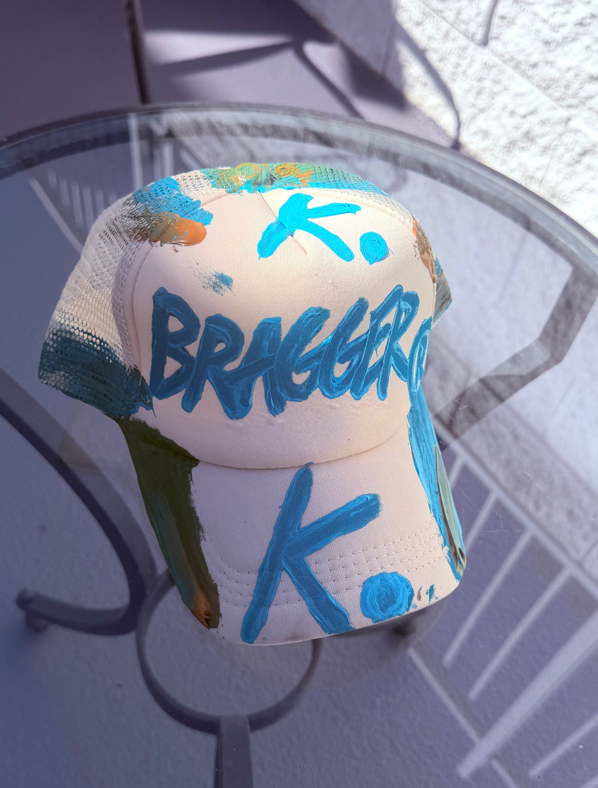 SEEMS LIKE BRAGGER K. HAT