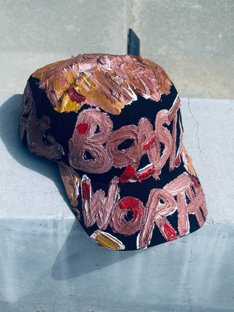 BOASTS WORTH K. HAT