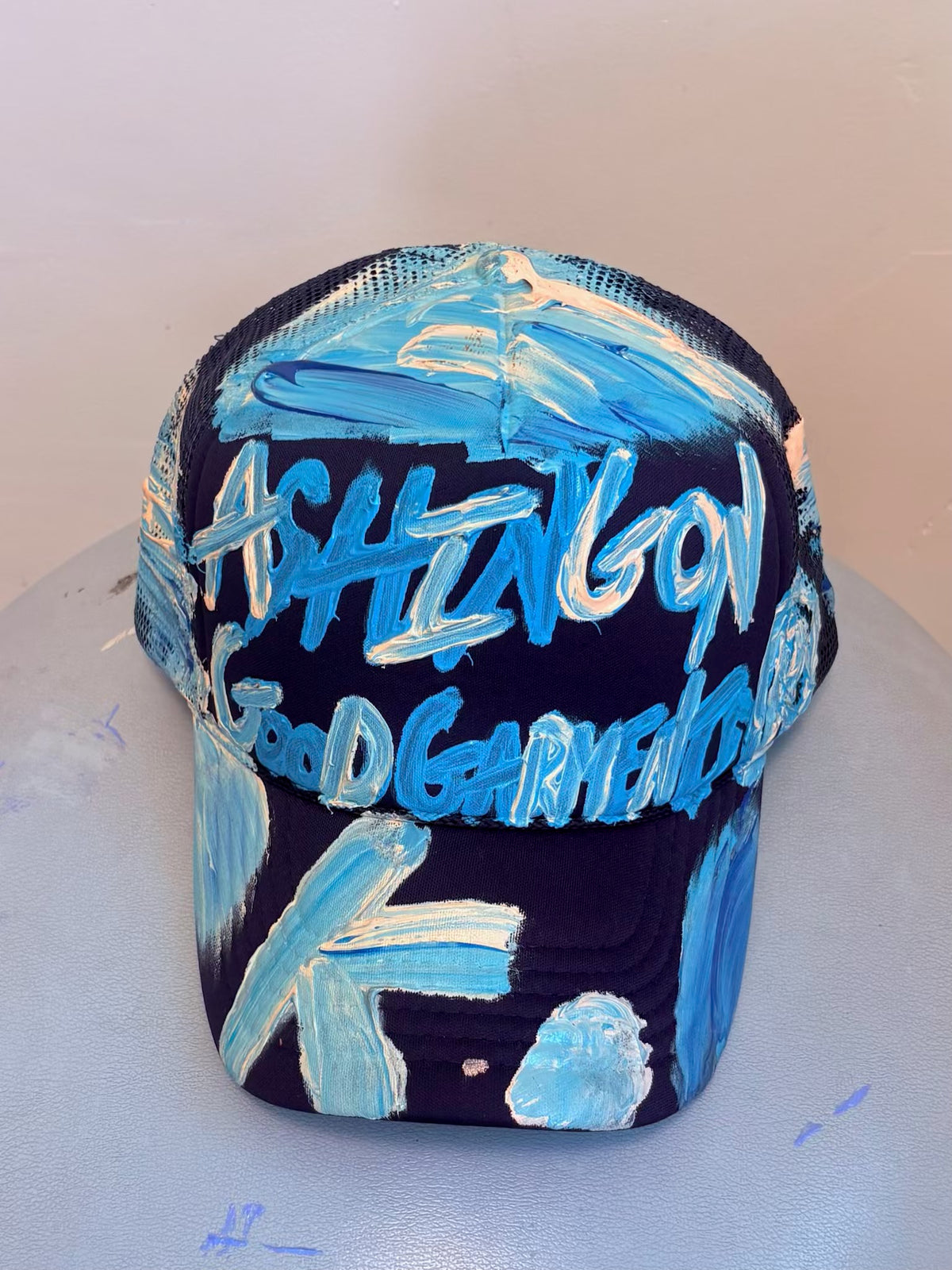 MORE ASHES K. HAT