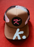 SHE ONLY AROUND FOR THE PARTIES K. HAT