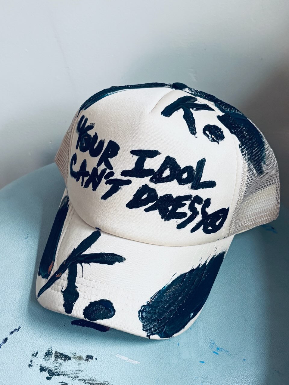 KNOWN BRAGGER K. HAT