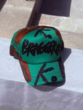BRAGGER AWARDED IT ALL K. HAT