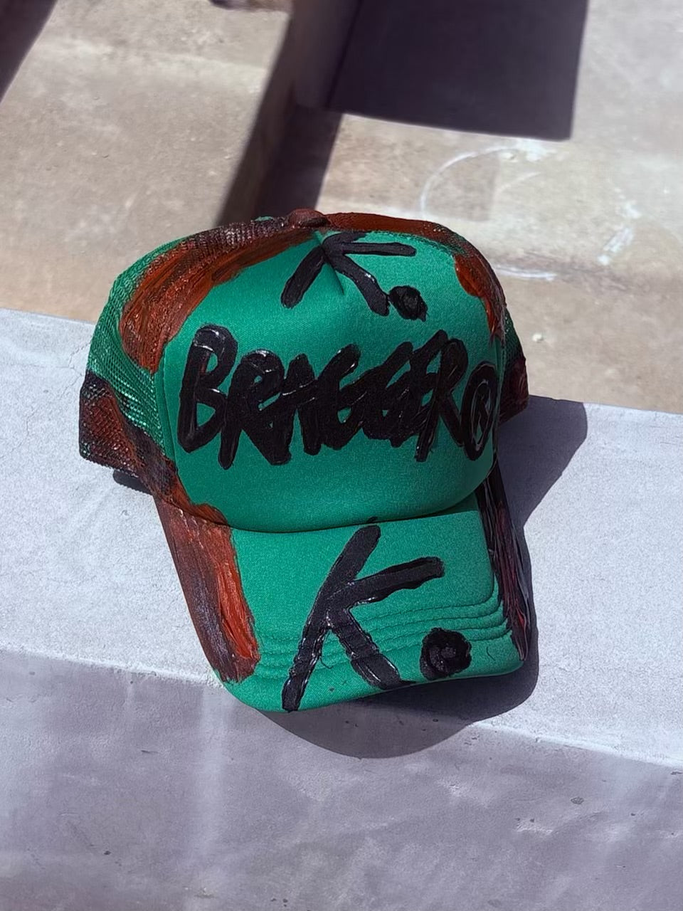 BRAGGER AWARDED IT ALL K. HAT