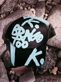 BRAG TOO K. HAT
