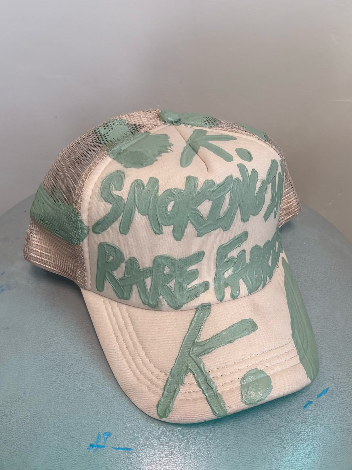 BETTER TO BE SMOKING K. HAT