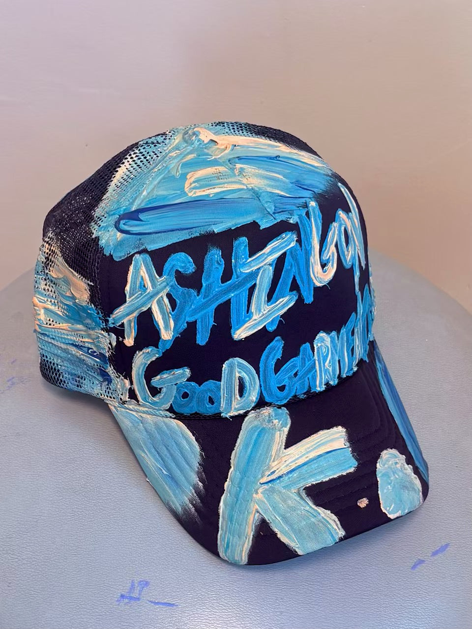 MORE ASHES K. HAT