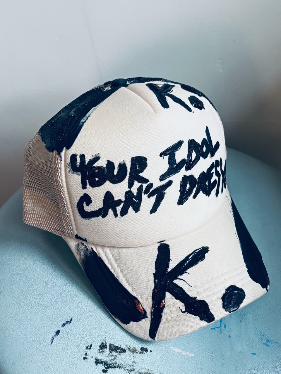 KNOWN BRAGGER K. HAT