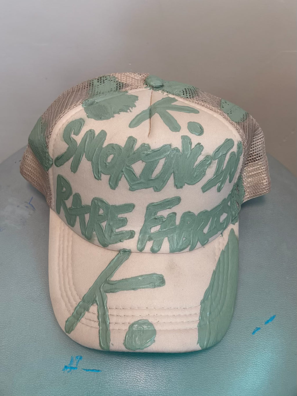 BETTER TO BE SMOKING K. HAT