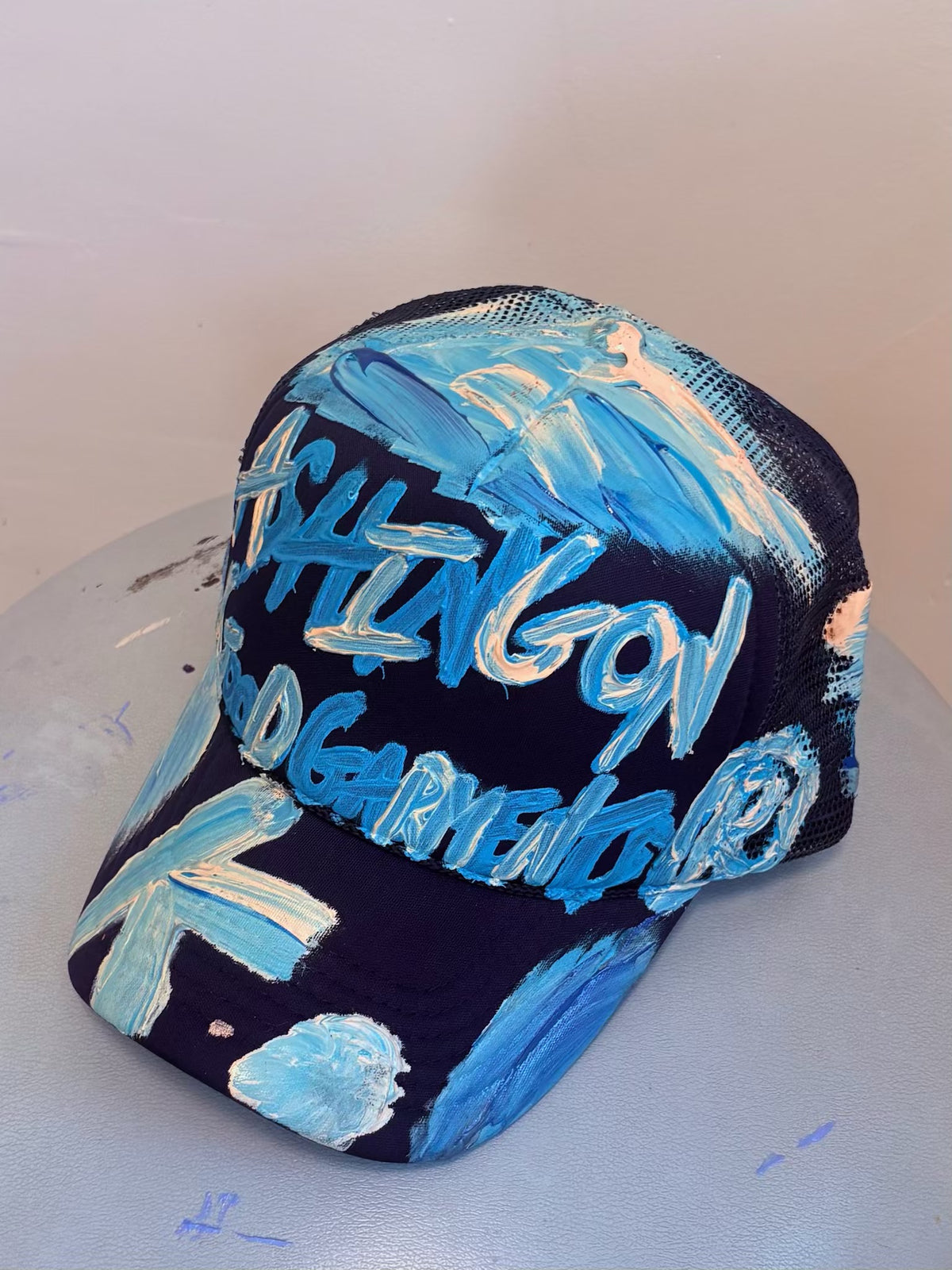 MORE ASHES K. HAT