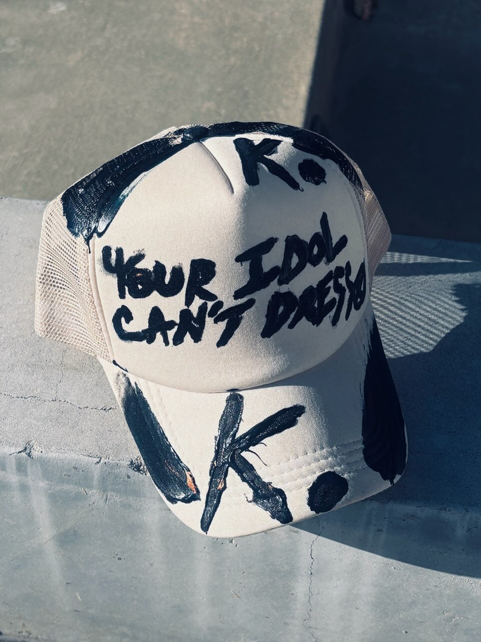 KNOWN BRAGGER K. HAT