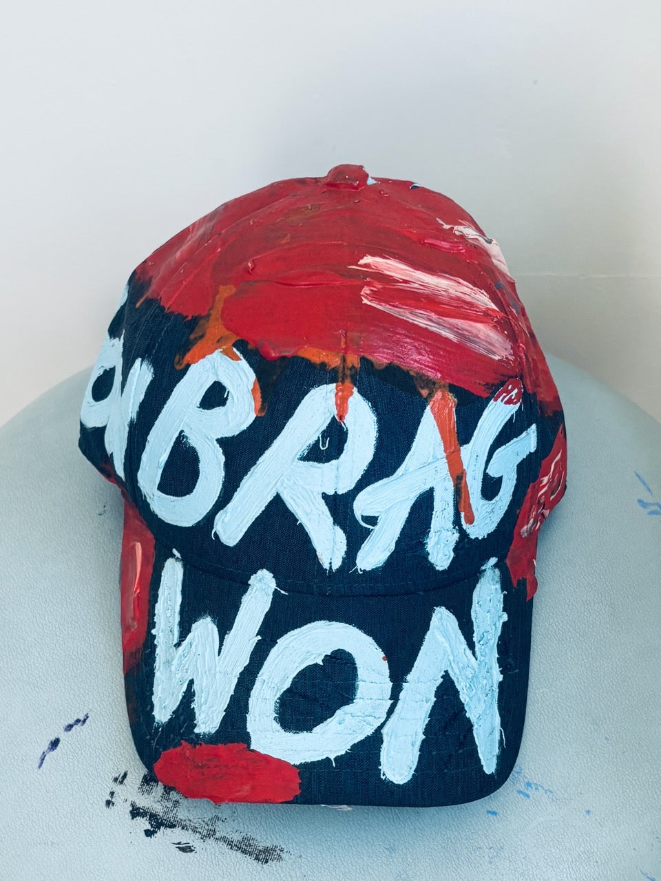 BRAG WON K. HAT