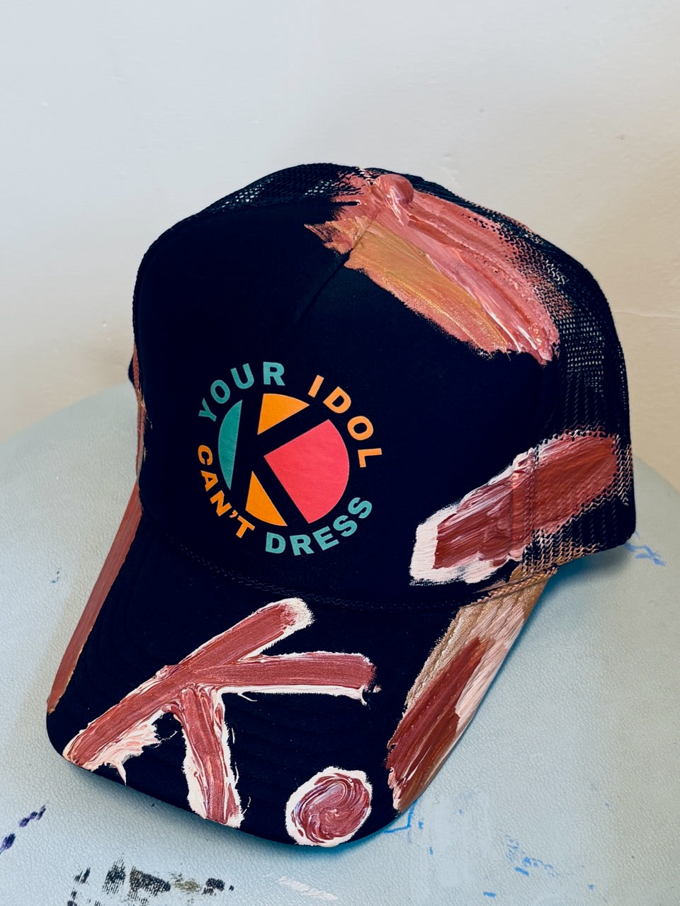 STILL ASHING ON GOOD GARMENTS K. HAT