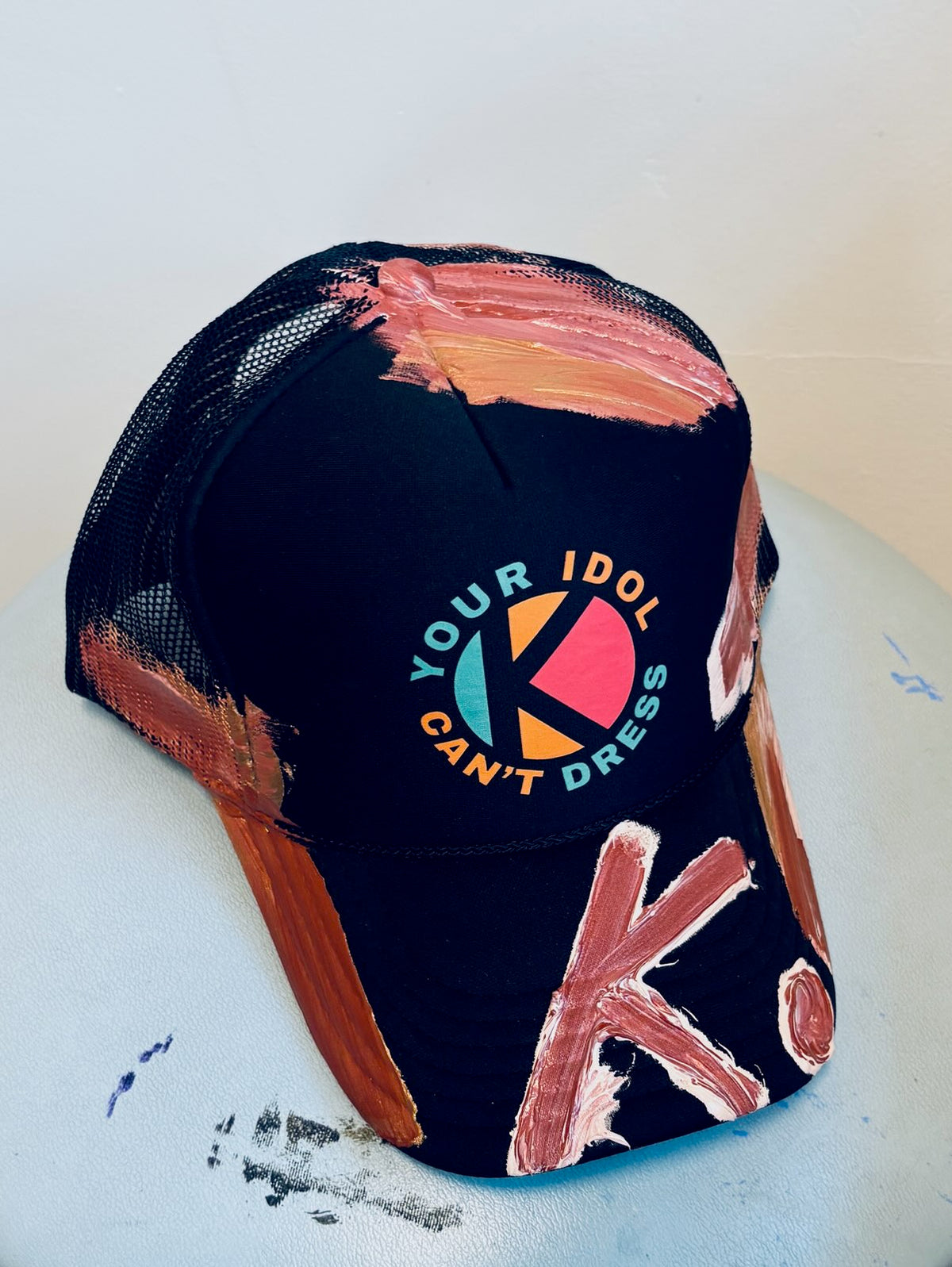 STILL ASHING ON GOOD GARMENTS K. HAT