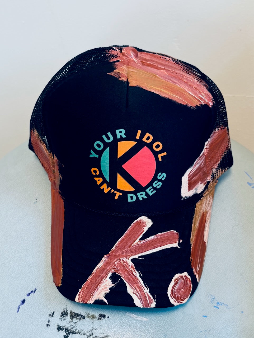 STILL ASHING ON GOOD GARMENTS K. HAT
