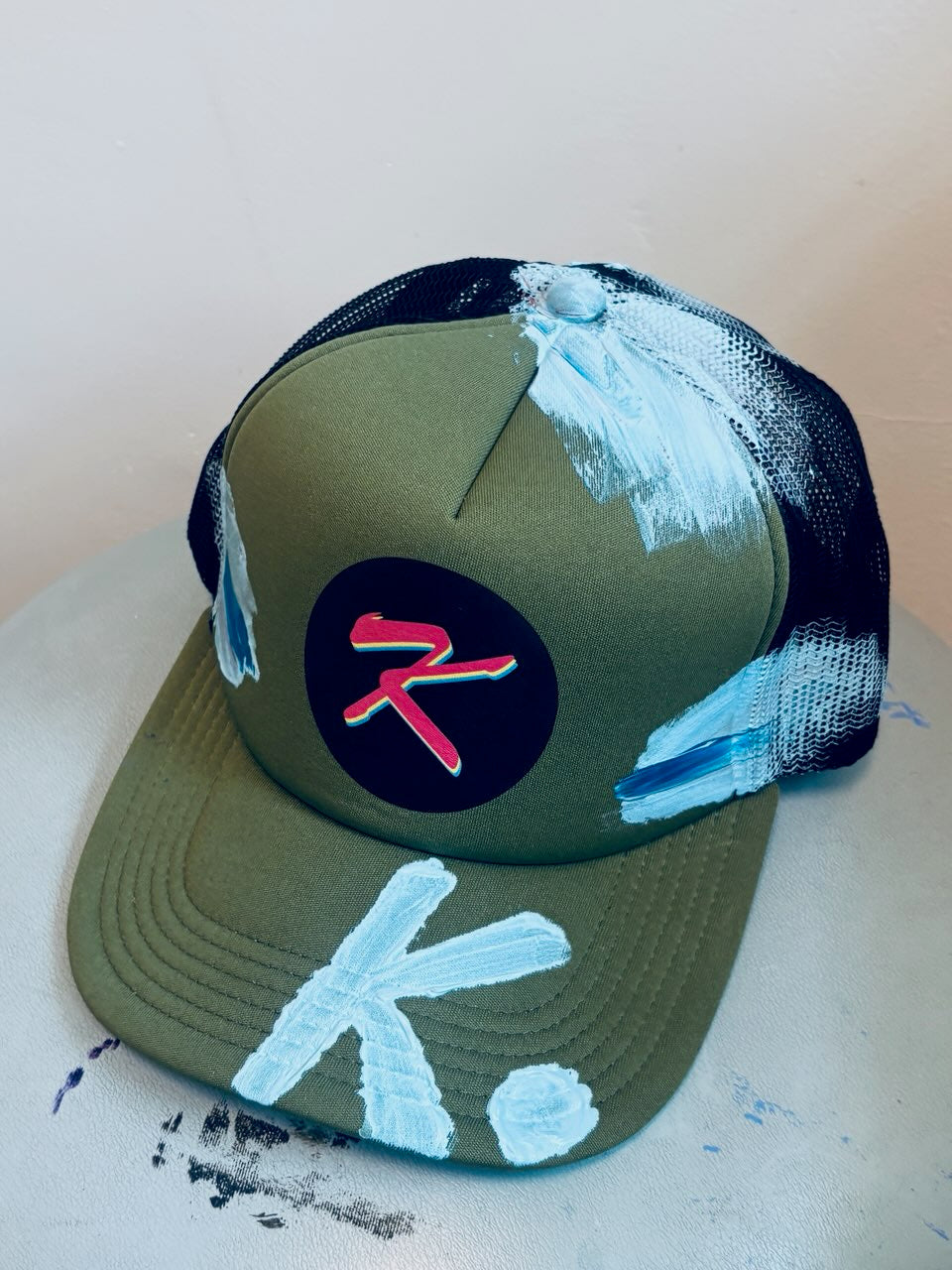 SHE NEEDS BRAG K. HAT